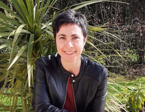 Une femme souriante, membre de l'équipe PTFCA
